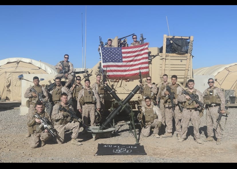 Marines group photo with flag